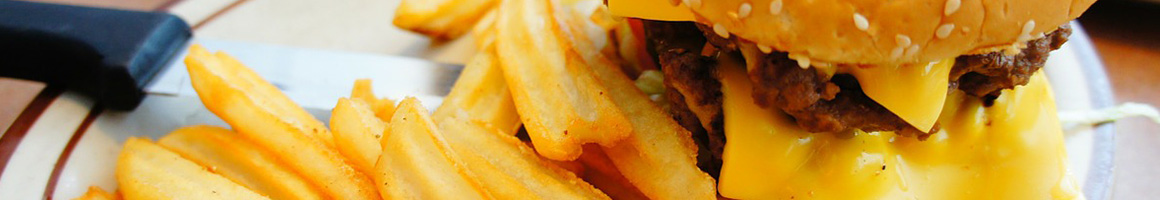Eating Burger at Burger Time restaurant in Pineville, MO.